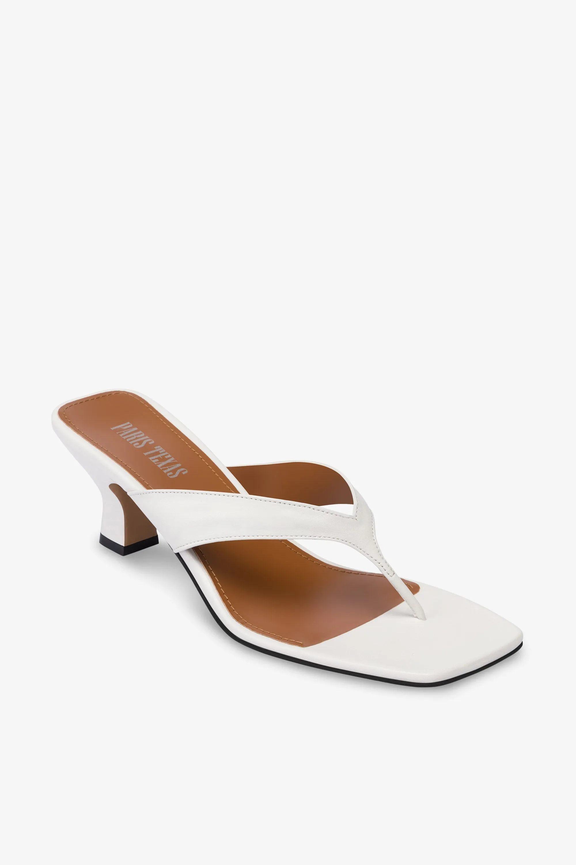 Mules with a toe in white leather