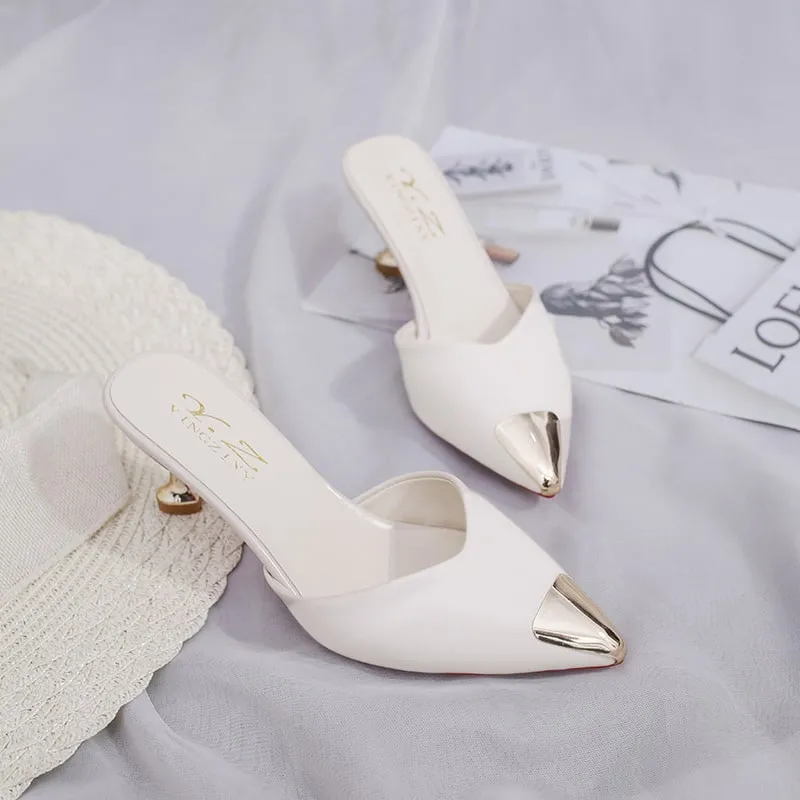 WHITE HIGH HEEL POINTED TOE MULE SHOE WITH METAL DESIGN.